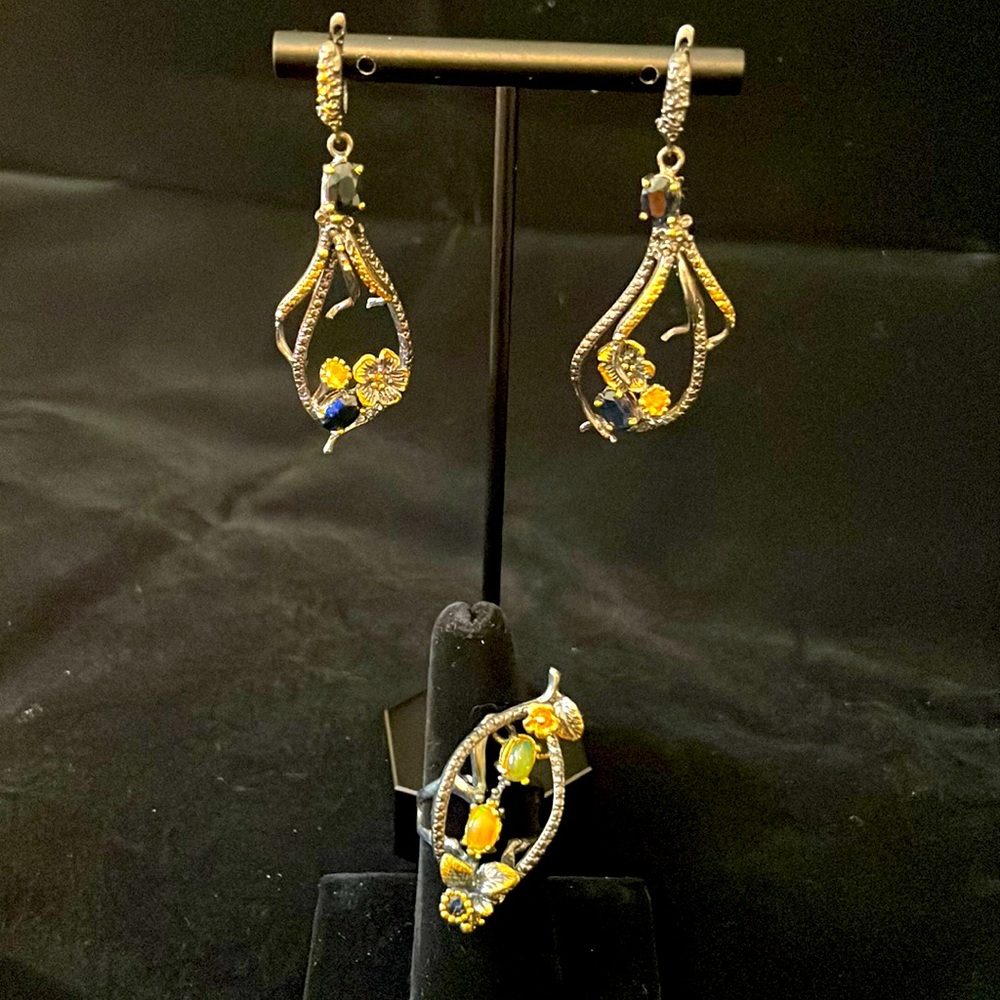 Silver and genuine gemstones and earrings and ring set. Ring size 8, fire opals.